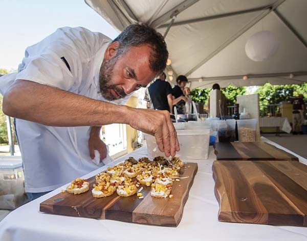 Chef Bill Fuller prepping food at last year's A Taste of Grow Pittsburgh.