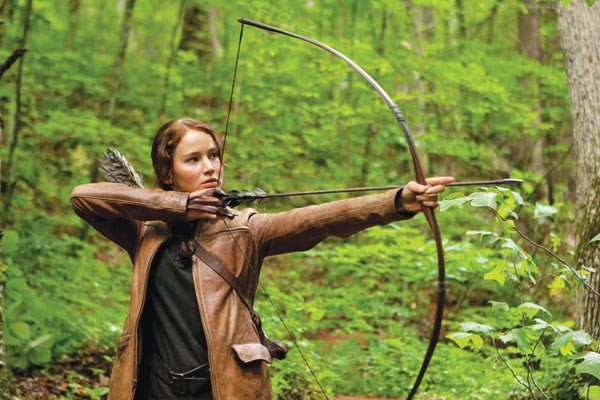 Katniss (Jennifer Lawrence): Her aim is true.
