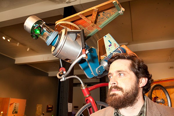 Meet Your Maker: Toby Fraley (right, with beard) and one of his creations at Space gallery