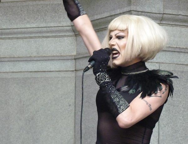 Sharon needles performing outside City Council on "Sharon Needles Day"