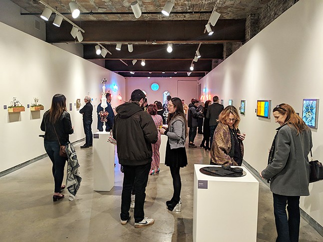 Visitors take in Material World on opening night