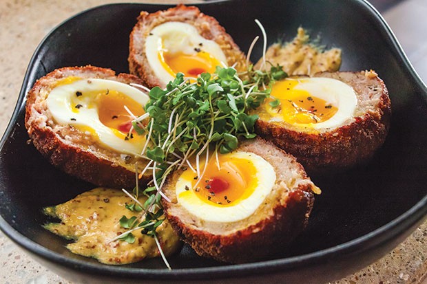 Scotch eggs: sambal mustard, seven-minute egg, housemade sausage and English toast crust