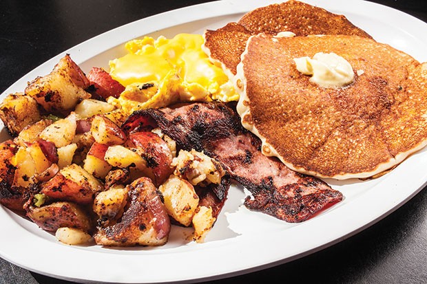 Al’s Special: Pancakes, bacon, home-fries and cheese eggs