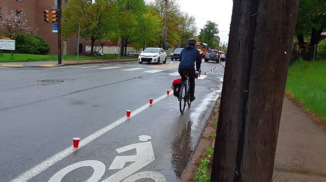 Advocates demonstrate vulnerability of cyclists in calling for parking-protected bike lanes in Pittsburgh