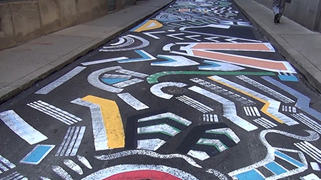Artist brightens Pittsburgh's Strawberry Way with mural underfoot