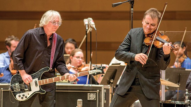 With a new concerto, former R.E.M. bassist bridges the gap between rock and classical