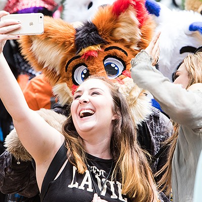 Furries show off their finest 'fursuits' to the public in Anthrocon's annual Fursuit Parade