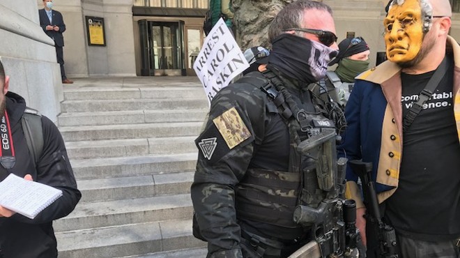 Armed civilian group at Pittsburgh’s reopen protest sports symbols linked to white nationalism