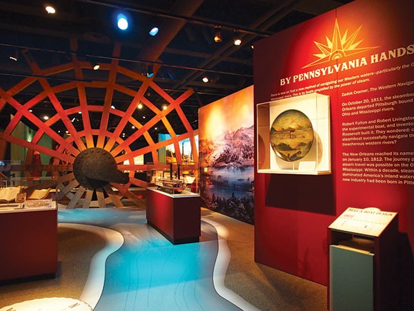 The Missouri Breaks: exhibit view, with replica paddle-wheel, of Pittsburgh's Lost Steamboat