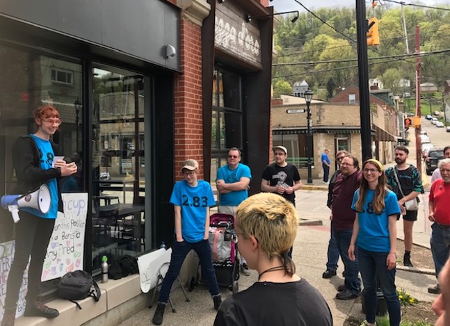 Protests at Tazza D’Oro after the Millvale coffee shop closed abruptly last week and fired all four employees