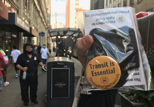 Pittsburghers for Public Transit distribute masks to riders, push for additional public transit funding