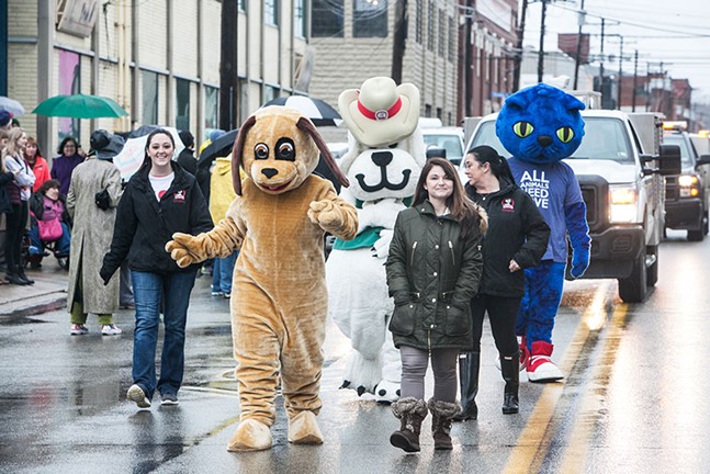 Animal Rescue League moves animals to new shelter during Moving of the Animals Parade