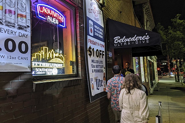 People wait outisde the Belvedere's Ultra-Dive bar in Pittsburgh.