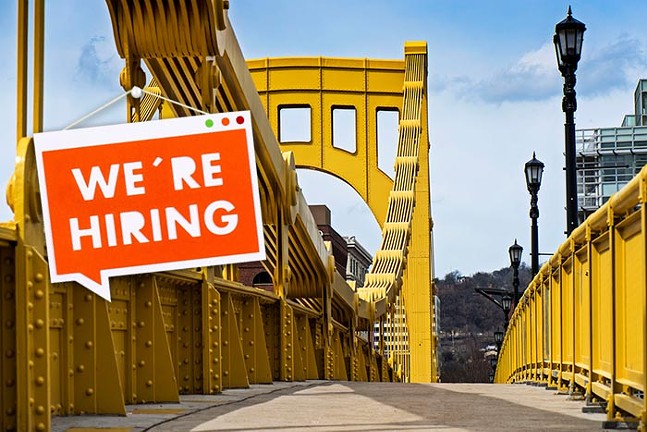A sign that says "We're hiring" placed on top of a close-up p photo of one of Pittsburgh's famous yellow bridges
