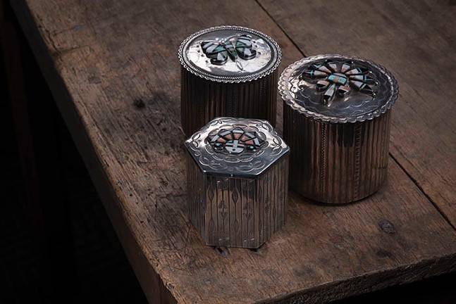 Silver boxes with intricate gemstone designs