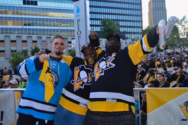 Fans cheer on the Pens as they beat the Washington Capitals in Round 2, Game 4 of the Stanley Cup Playoffs (6)