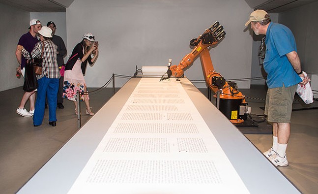 At Wood Street, robots draw a Martian landscape and copy the Bible