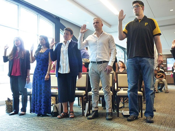 New American citizens being sworn in at PNC Park